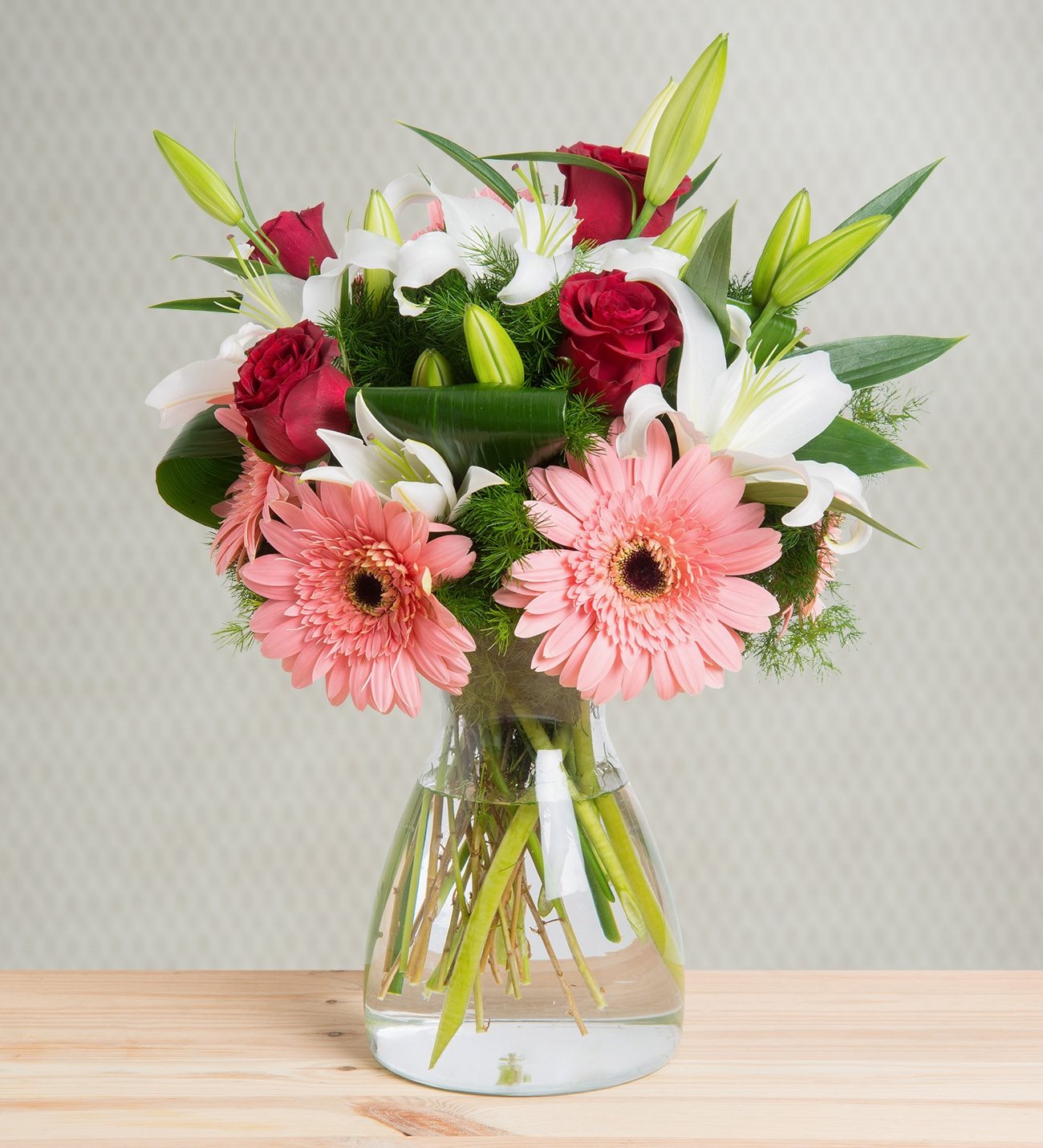 lilies roses and gerberas